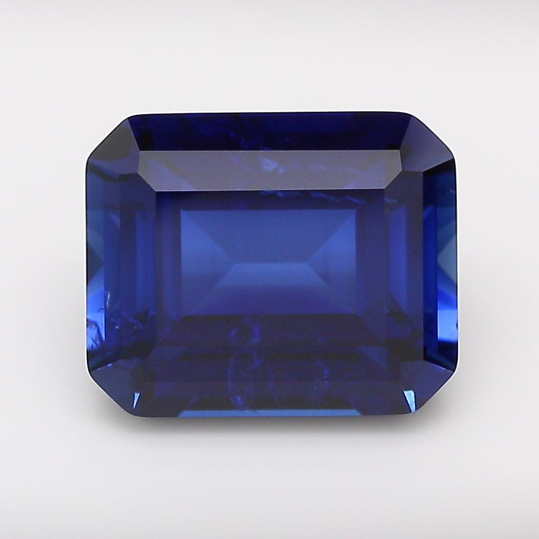 6.05 Carat Royal Blue Emerald Cut Lab Grown Sapphire