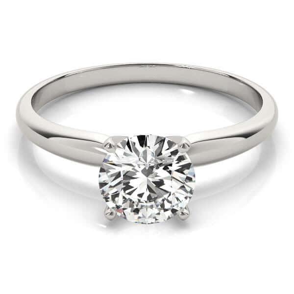 "Discover the timeless elegance of a 0.50-2.00 carat diamond solitaire engagement ring by Revival Diamonds. Featuring a stunning prong-set lab-grown diamond in 14K white gold, this fine jewelry piece radiates brilliance with G-H color and VS-SI1 clarity. Perfect for proposals, anniversaries, or special occasions, each ring comes in a luxurious gift box. Shop ethical and affordable diamonds without compromising quality. A beautiful choice for women who value sophistication and sustainability."
