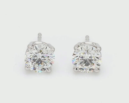 14K white gold earrings, round diamond studs, lab-grown diamonds, ethical jewelry, diamond earrings F-G-H color, VS2-SI1 clarity, screw-back earrings, solitaire diamond studs, white gold jewelry, classic stud earrings, 14K gold diamond earrings, timeless earrings, ethical diamond studs, diamond gift for her, elegant diamond earrings.
