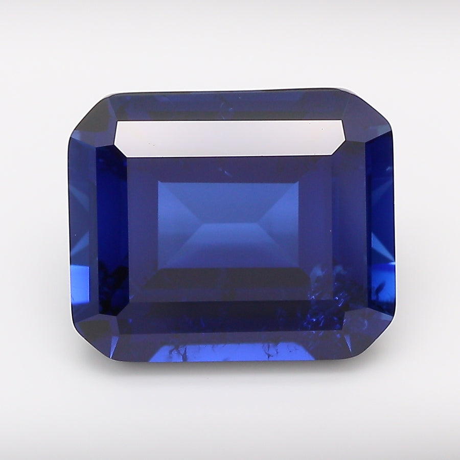 7.62 Carat Royal Blue Emerald Cut Lab Grown Sapphire